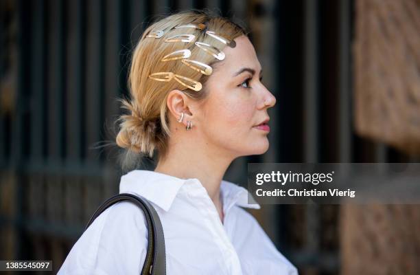 Amelie Stanescu seen with hair clips wearing white button shirt Arket, brown skirt awake mode, white loafers shoes Prada, two tone brown white bag...