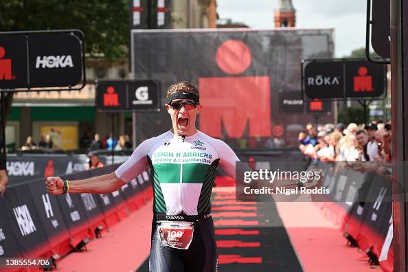 Athletes react after finishing Ironman UK on July 2, 2023 in Bolton