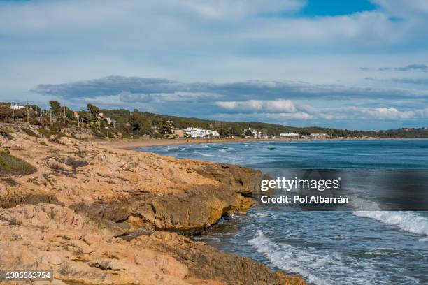 tarragona platja llarga in costa dorada of catalonia playa larga. cala romana. - tarragona stock pictures, royalty-free photos & images