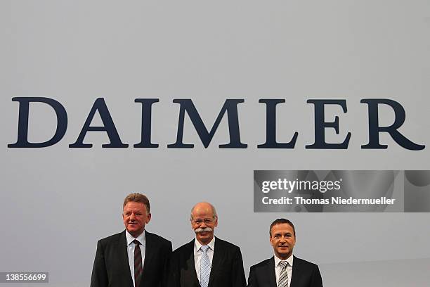 The Daimler Board of Directors Andreas Renschler, Bodo Uebber, and CEO of Daimler AG, Dieter Zetsche are seen during the company's financial...