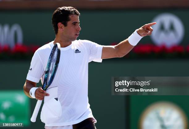 Jaume Munar of Spain reacts after a point against Taylor Fritz of the United States in their third round match on Day 9 of the BNP Paribas Open at...