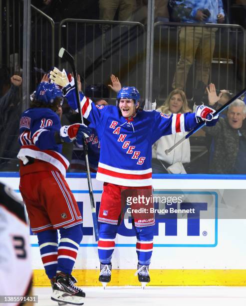 Adam Fox of the New York Rangers celebrates his game winning overtime goal against the Anaheim Ducks at Madison Square Garden on March 15, 2022 in...