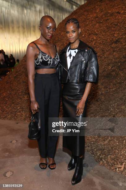 Danai Gurira and Letitia Wright attends the Alexander McQueen AW22 Runway Show at Brooklyn Navy Yard on March 15, 2022 in Brooklyn City.