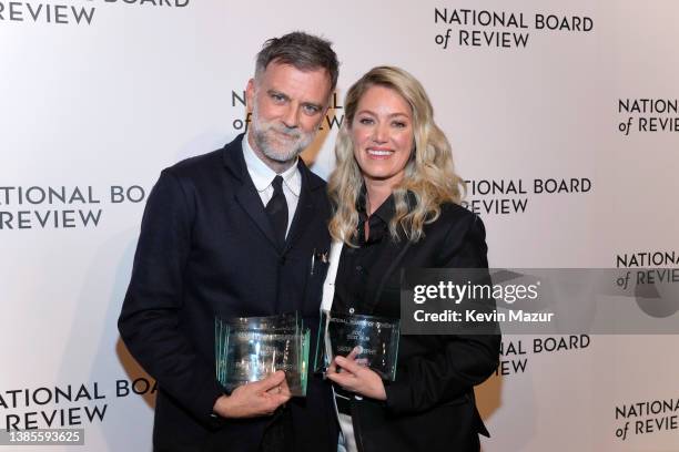 Paul Thomas Anderson and Sara Murphy pose with the award for Best Director for 'Licorice Pizza' at the National Board of Review annual awards gala at...