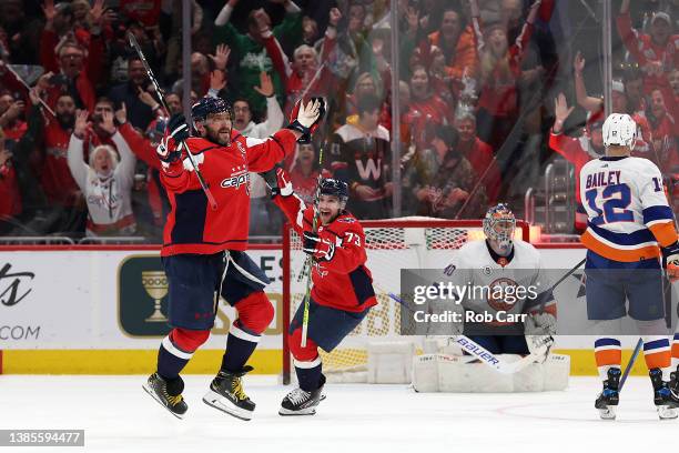 Alex Ovechkin of the Washington Capitals celebrates after scoring career goal number 767 to move into third all time in scoring in The NHL during the...