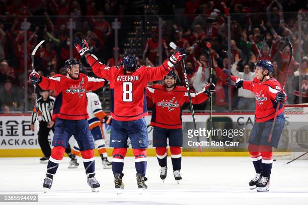 Alex Ovechkin of the Washington Capitals celebrates after scoring career goal number 767 to move into third all time in scoring in The NHL during the...