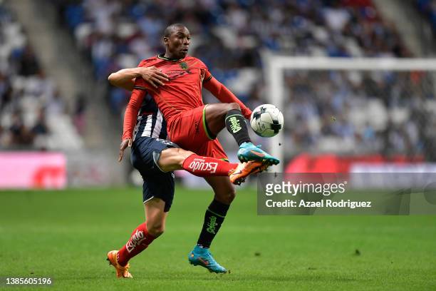 Stefan Medina of Monterrey fights for the ball with Fabián Castillo of Juárez during the 5th round match between Monterrey and FC Juarez as part of...