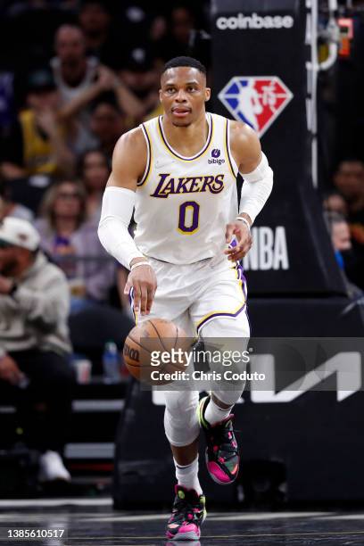 Russell Westbrook of the Los Angeles Lakers dribbles the ball during the first half against the Phoenix Suns at Footprint Center on March 13, 2022 in...