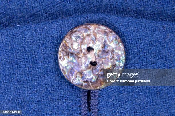 navy colored fabric with button - rayon stock pictures, royalty-free photos & images