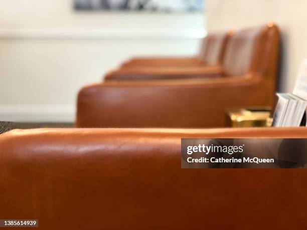 patient waiting room in doctor’s medical practice office - leather office chair stock pictures, royalty-free photos & images