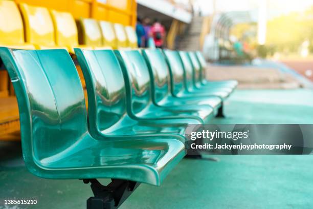 full frame shot of empty chairs - football bench stock pictures, royalty-free photos & images