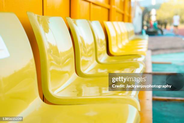 full frame shot of empty chairs - large group of objects sport stock pictures, royalty-free photos & images