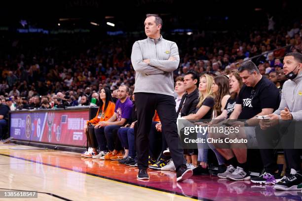 Head coach Frank Vogel of the Los Angeles Lakers watches the action during the first half against the Phoenix Suns at Footprint Center on March 13,...