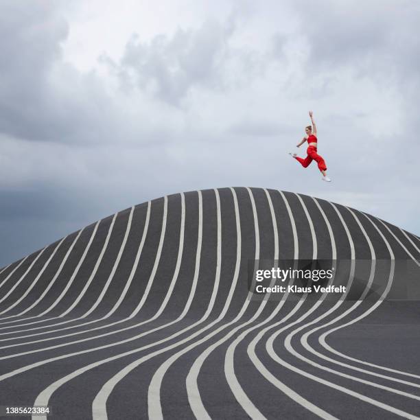 female dancer practicing on road - ballet bend stock pictures, royalty-free photos & images