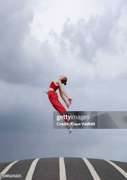 dancer jumping while practicing ballet - dance fly stock pictures, royalty-free photos & images