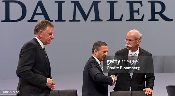 Andreas Renschler, head of Daimler AG's truck division, left, Bodo Uebber, chief financial officer of Daimler AG, center, and Dieter Zetsche, chief...