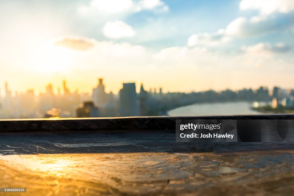 Wood table with cityscape background