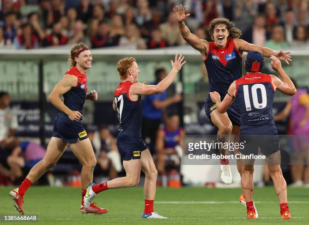 Luke Jackson of the Demons celebrates after scoring a goal during the round one AFL match between the Melbourne Demons and the Western Bulldogs at...