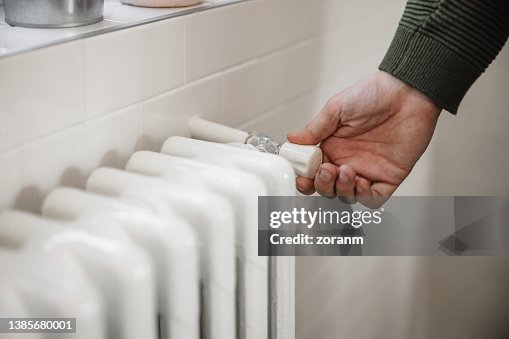 Trying to turn the heat up on home radiator heater, new world economic crisis Trying to turn the heat up on home radiator heater, new world economic crisis