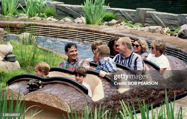Princess Diana , along with her friends Kate Menzies and Catherine Soames , rides 26 August 1993 the Splash Mountain ride at Disney World's Magic...