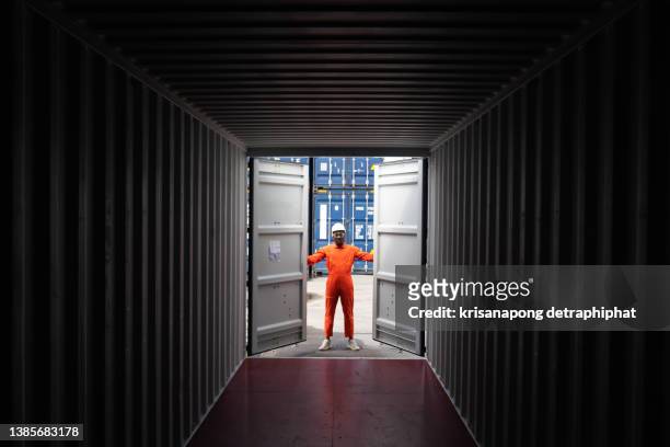 warehouse logistic staffs opening containers box door checking products from cargo freight ship at cargo container shipping - container stock pictures, royalty-free photos & images