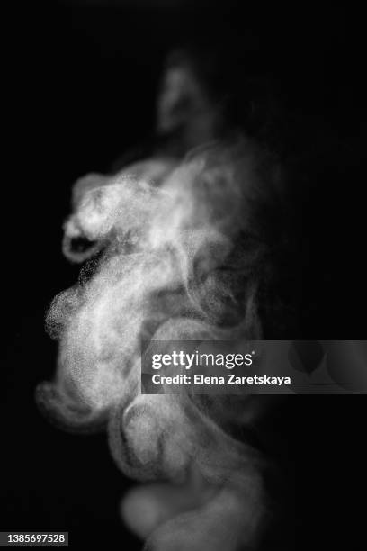 steam on a black background - smoke black background ストックフォトと画像