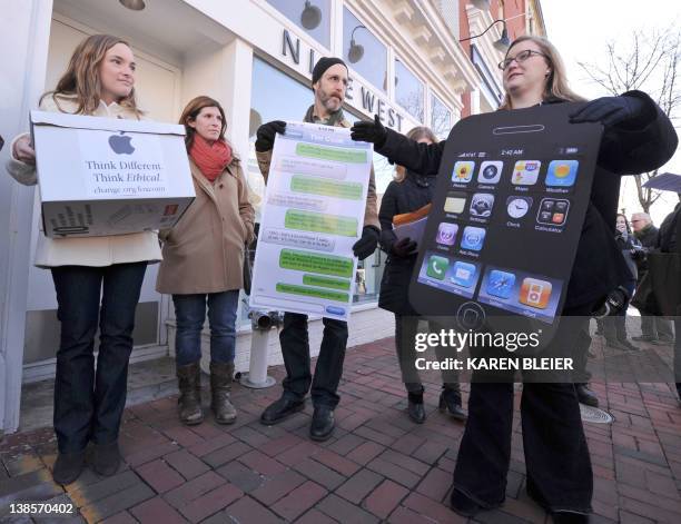 Amanda Kloer, Director of Organizing at Campaign on Change.org, speaks to reporters during a protest in front of the Apple store in Washington, DC on...