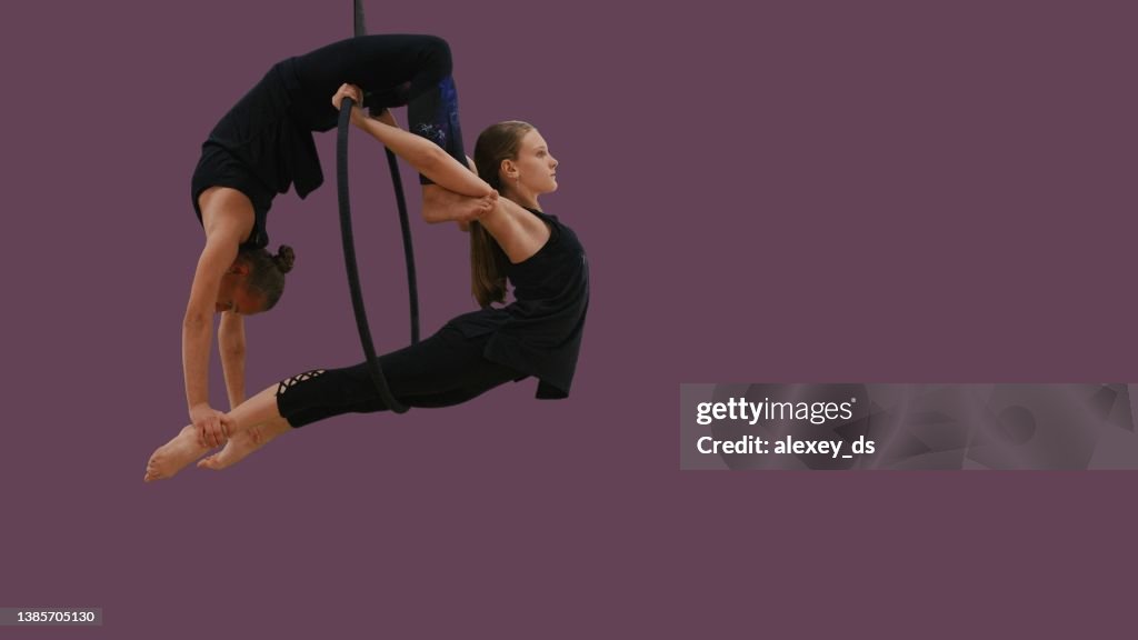 High Risk Acrobats Two Aerial Acrobats On Aerial Hoop Series Of Photos High-Res Stock ...