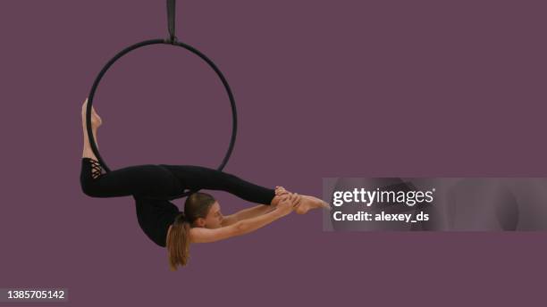 aerial acrobat on the aerial hoop, series of photos - lyra stock pictures, royalty-free photos & images