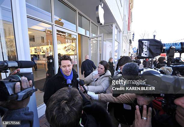 Mark Shields, who launched the Campaign on Change.org, speaks to reporters during a protest in front of the Apple store in Washington, DC on February...