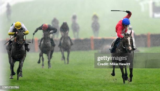 Paul Townend on Sir Gerhard approach the finish line to win the Ballymore Novices' Hurdle race before Davy Russell on Three Stripe Life during day...