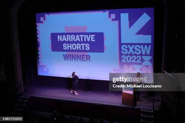 Tang Yi accepts the Narrative Short Competition Award for ‘All the Crows in the World’ at the SXSW Film Awards during the 2022 SXSW Conference and...