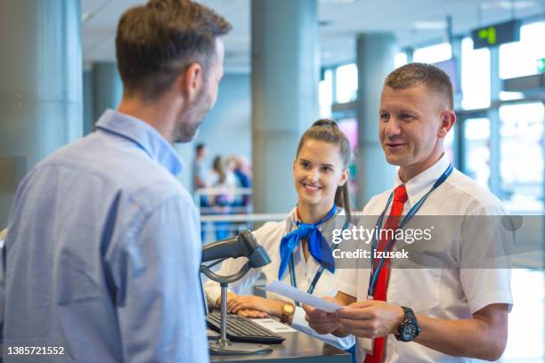 man boarding the plane at airport - airline service stock pictures, royalty-free photos & images