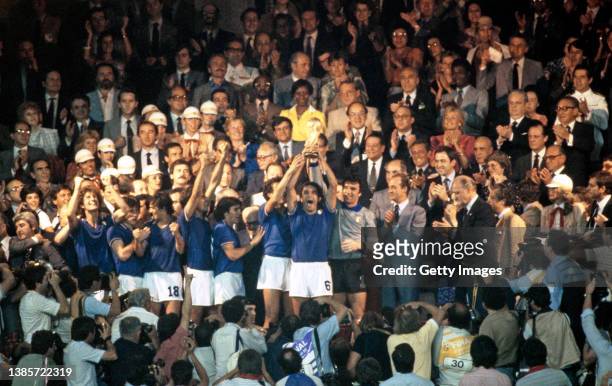 Claudio Gentile of Italy holds aloft the World Cup with team captain with goalkeeper Dino Zoff after Italy's victory over West Germany in the 1982...