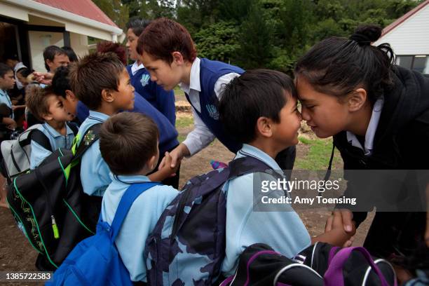 Students say goodbye to eachother with a Hongi at their school, Te Wharekura o Ngati Rongomai in Rotorua, New Zealand on February 12, 2010. Te...