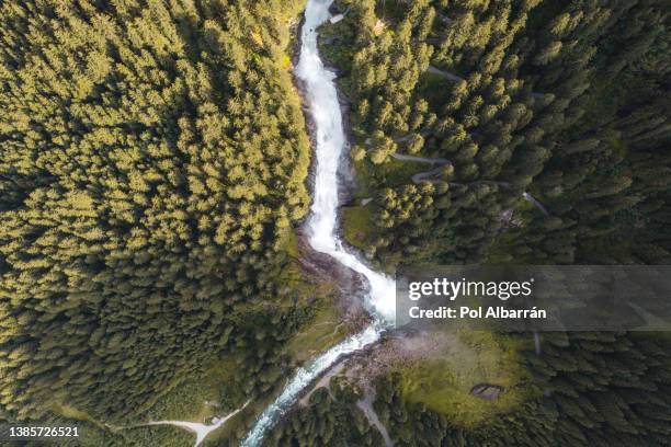 aerial view of krimml waterfall cascades, austria. drone flight above the water flow. - hohe tauern national park stockfoto's en -beelden