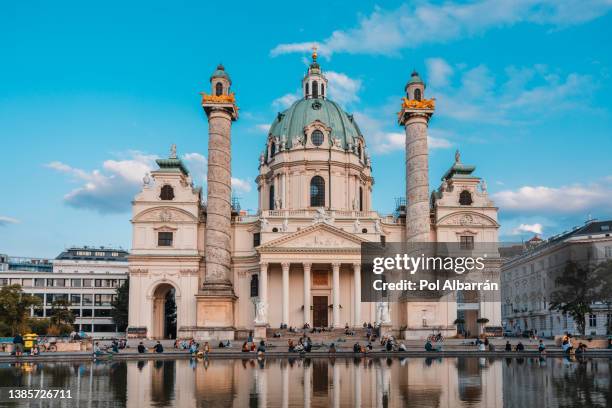 wiener karlskirche (saint charles's church) at karlsplatz, vienna, austria. - vienna state opera stock pictures, royalty-free photos & images