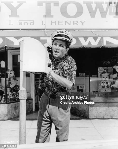 Peter Falk on phone in a scene from the film 'It's A Mad Mad Mad Mad World', 1963.