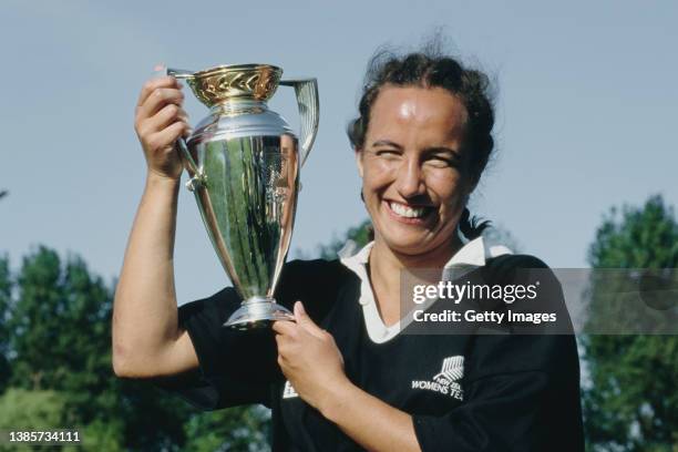 New Zealand player Farah Palmer lifts the trophy after Women's Rugby Union World Cup Final between New Zealand and USA played on May 16th, 1998 in...