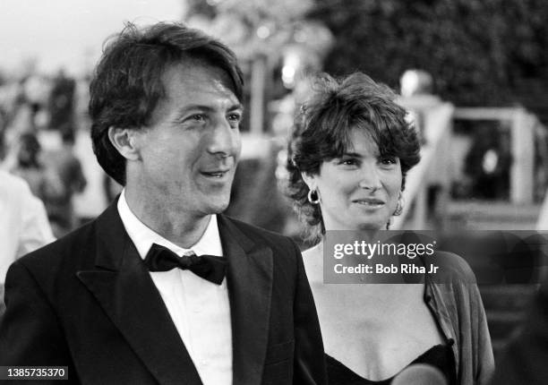 Dustin Hoffman and wife Lisa arrive during the 55th Annual Academy Awards at the Dorothy Chandler Pavilion, April 11, 1983 in Los Angeles, California.