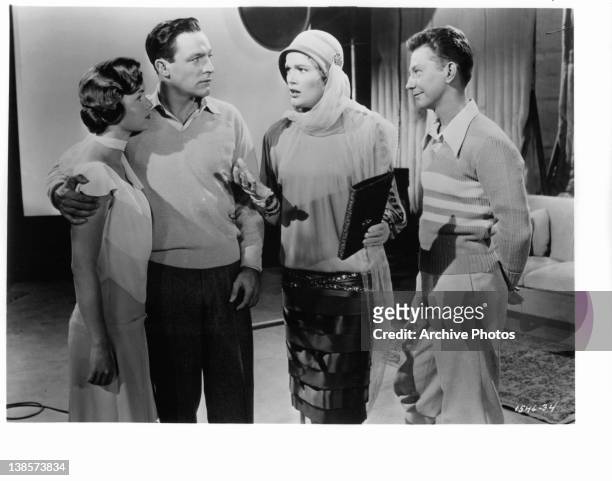 Debbie Reynolds, Gene Kelly, Donald O'Connor and Jean Hagen in a scene from the film 'Singin' In The Rain', 1952.