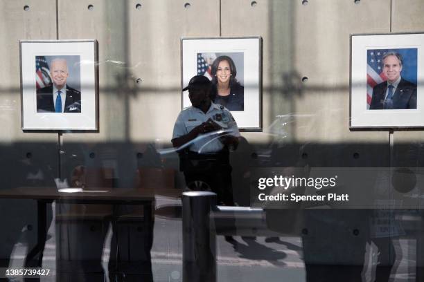 Portraits of President Joe Biden, Vice President Kamala Harris and Secretary of State Antony Blinken sit along a wall inside the U.S. Mission to the...