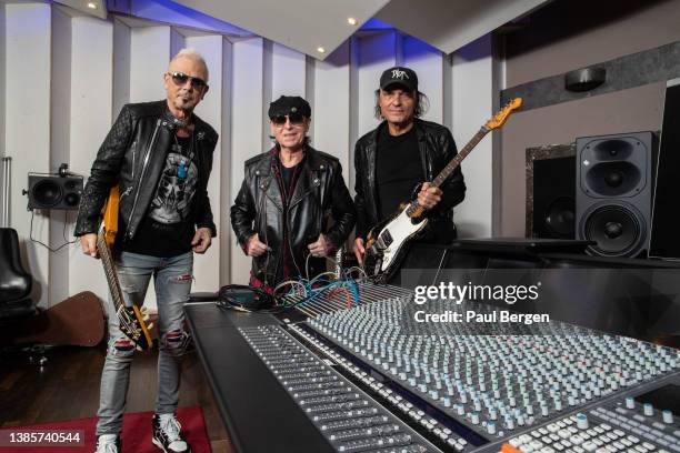Group portrait of German rock band Scorpions with left to right Rudolf Schenker , Klaus Meine , and Matthias Jabs , Hanover, Germany 10th December...