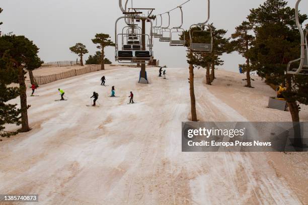 People ski at the Navacerrada ski resort on March 16 in Guadarrama, Madrid, Spain. The passage of the squall Celia through the Iberian Peninsula has...