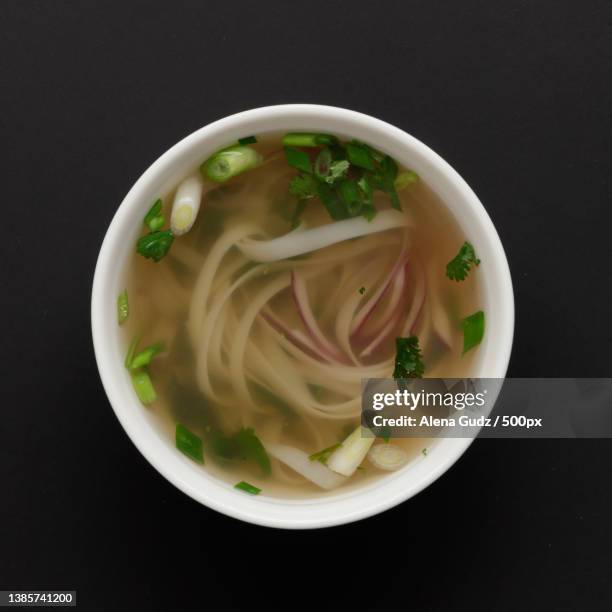 thai noodle soup top view,directly above shot of soup in bowl on black background - miso sauce stock pictures, royalty-free photos & images