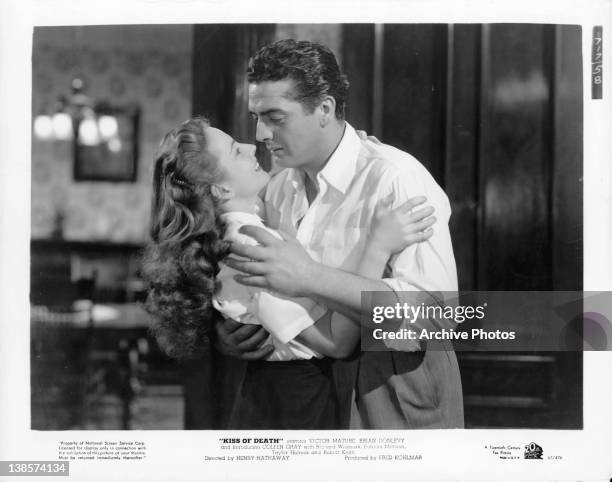 Coleen Gray is embraced by Victor Mature in a scene from the film 'Kiss Of Death', 1947.