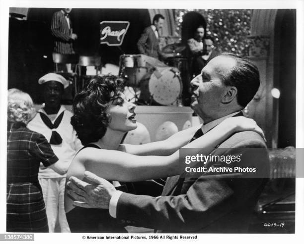 Magali Noel dancing with Annibale Ninchi in a scene from the film 'La Dolce Vita', 1960.