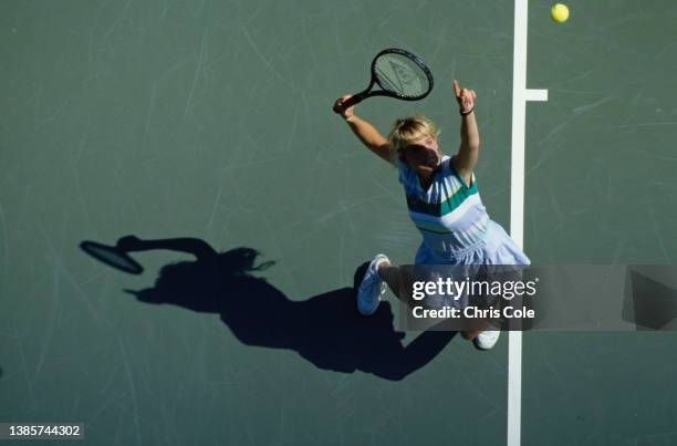 Carling Bassett from Canada keeps her eyes on the tennis ball as she serves to Claudia Kohde-Kilsch of Germany during their Women's Singles Second...