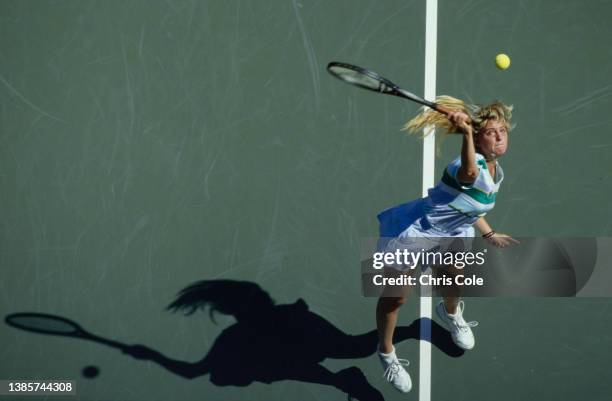 Carling Bassett from Canada keeps her eyes on the tennis ball as she serves to Claudia Kohde-Kilsch of Germany during their Women's Singles Second...