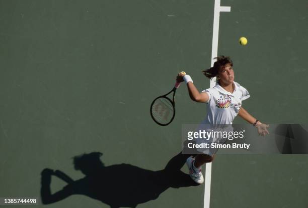 Jennifer Capriati from the United States keeps her eyes on the tennis ball as she serves to Rachel McQuillan of Australia during their Junior Girls...